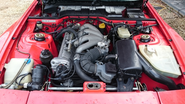 Engine bay_ throttle cam_top mount top hats.JPG